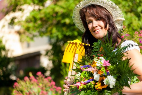 Professional landscapers designing a garden in Peckham